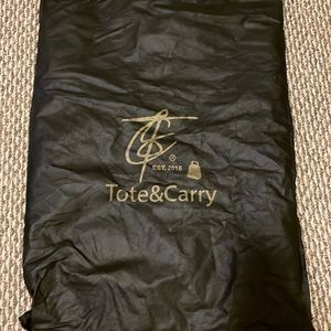 Brand new Tote and Carry book bag ! With dust bag